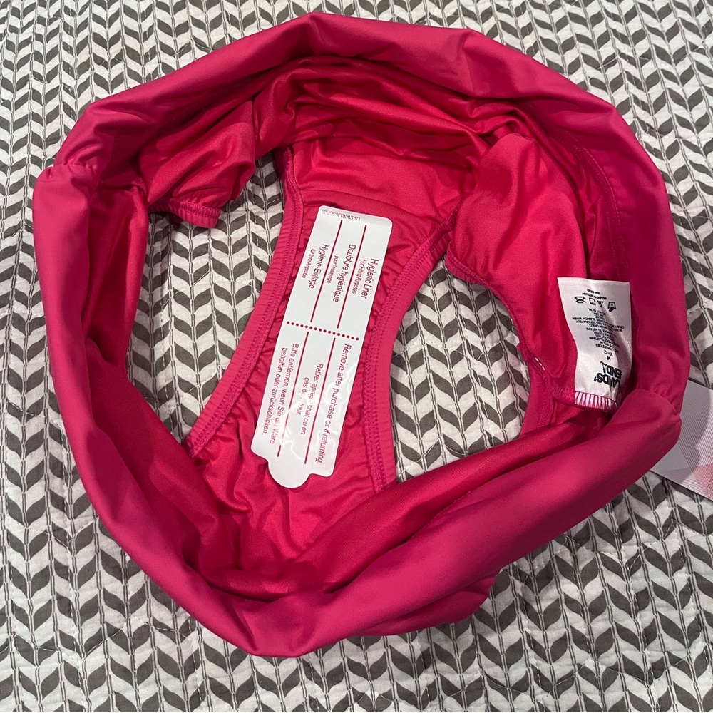 New pink swim bottoms. Waistband can be folded down or worn up. - Picture 4 of 4